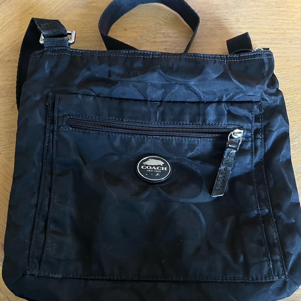 Coach Black Messenger Bag Sleek and Versatile
